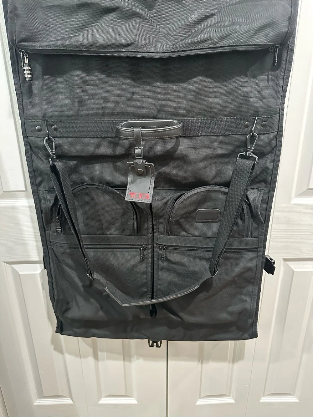Tumi Black Travel Garment Bag with Dual Front Pockets and Shoulder Strap